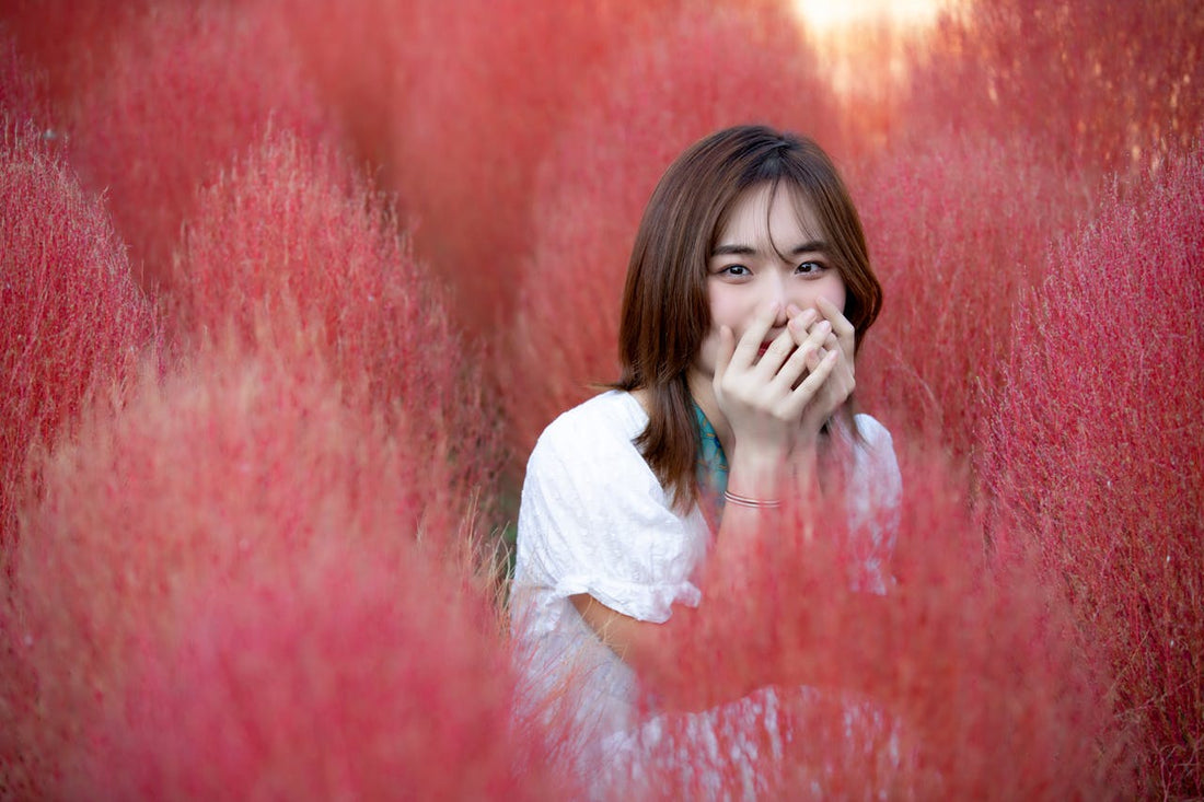 What Does It Mean When a Girl Covers Her Mouth When She Laughs?